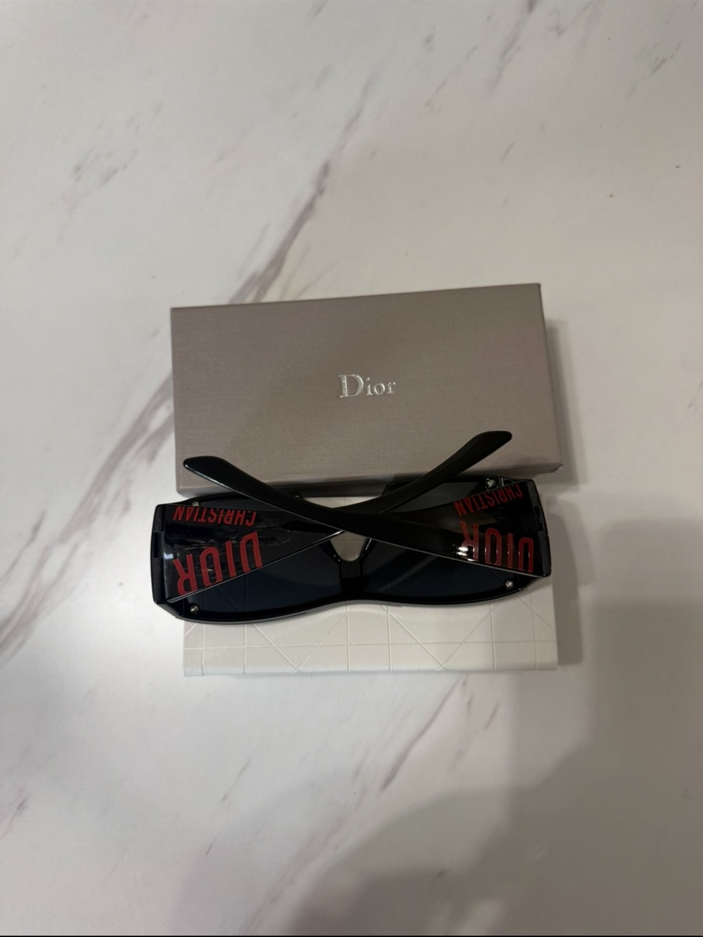 Black Sunglasses with Red Logo Shield Lenses